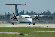 13:18 DASH8 TAXIWAY T-5